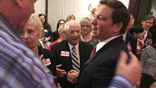 U.S. Rep. Ron DeSantis, R-Palm Coast, greets supporters in Boca Raton after formally kicking off his campaign for Florida governor in January. (George Bennett/The Palm Beach Post)