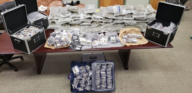 BCSO seized 50lbs of marijuana, 1400 THC vape pens, small amounts of other drugs and $50,000 in US currency during a raid over the weekend. [CONTRIBUTED PHOTO]