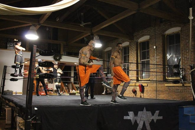Criminals in Action (C.I.A. – Frank Bones and Gree-d) are pumped to fight WAW Wrestling team champions SYPA (Derrick Conway and Thomas Andrews) at the XIX anniversary show at Bareknuckle Murphy’s Gym in Manchester, NH, in November 2017. [Courtesy photo]