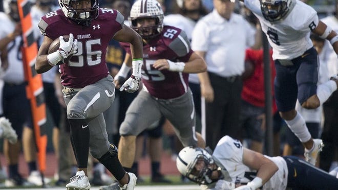 Round Rock running back Marquis Brown had 130 yards on 12 carries in a loss to Belton. NICK WAGNER / AMERICAN-STATESMAN