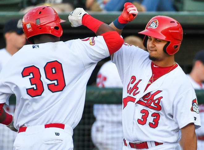 JOURNAL STAR FILE PHOTO Yariel Gonzalez (right) was in the heart of a productive Peoria Chiefs offense this season in the Midwest League.
