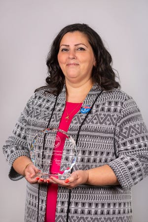 Connie Costa, an activities assistant at Life Care Center of Raynham, received Life Care Centers of America’s Northeast Division Whatever It Takes And Then Some Award on Aug. 29 for her dedication to customer service. [Submitted photo]