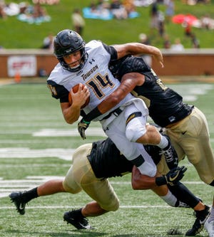A strong pass rush, like here with Wake Forest linebackers Demetrius Kemp, left, and Justin Strnad sacking Towson quarterback Tom Flacco, might help the pass defense.