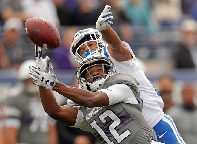 Duke's Michael Carter II, top, breaks up a pass intended for Northwestern's JJ Jefferson during last weekend's game.