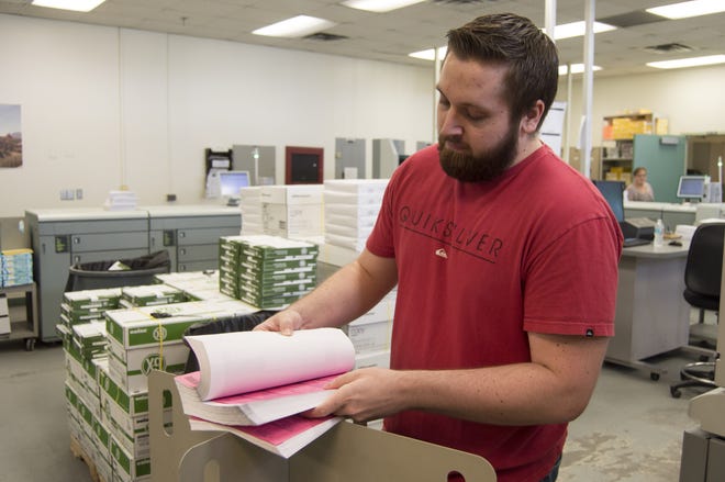 The Volusia County Schools Copy Center where Chris Conklin works completes about 4,000 printing jobs a day. But it's the 28 percent of printing that happens on school campuses that has teachers frustrated this year. [News-Journal/Cassidy Alexander]