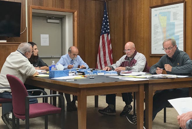 The North Hornell Village Board mulls contractual issues with the City of Hornell during their monthly meeting on Monday. [JASON JORDAN PHOTO]