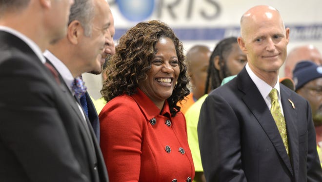 Kimberly Daniels was photographed with Gov. Rick Scott in 2015, before she was elected to the Florida House of Representatives. [Florida Times-Union]