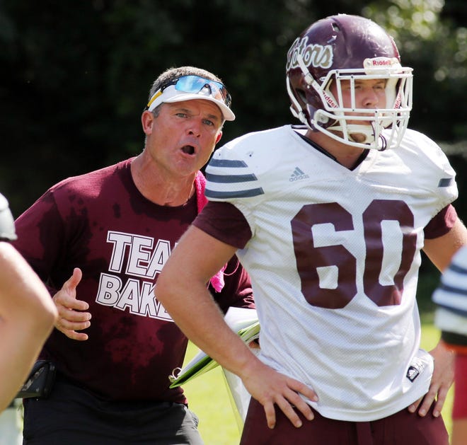 Baker head coach Matt Brunson motivates his team during a recent practice. [MICHAEL SNYDER/DAILY NEWS]