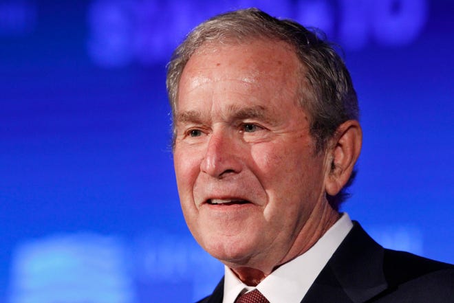 FILE - In this June 23, 2017 file photo, former President George W. Bush speaks during "Stand-To," a summit held by the George W. Bush Institute focused on veteran transition, in Washington. Bush will be in Florida on Friday to fundraise for Gov. Rick Scott's bid to oust Democratic Sen. Bill Nelson in a closely watched and expensive campaign. (AP Photo/Jacquelyn Martin)