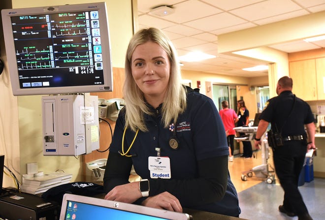 EMT student Maria Sigurros Ingadottir, is seen in St. Anne's Hospital Emergency Department. [Herald News Photo | Jack Foley]