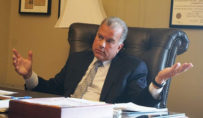 House Speaker Nicholas Mattiello at his office at the State House in August. His leadership suffered two blows in a single day on Wednesday: the loss of the Pawtucket Red Sox to Worcester, Mass., and the primary-election losses of House candidates hehad supported. The portrait on the wall behind him is of Roswell B. Burchard, a Republican and House Speaker from 1907-1911, according to Steven Frias, Mattiello's opponent in November. [The Providence Journal / Sandor Bodo]