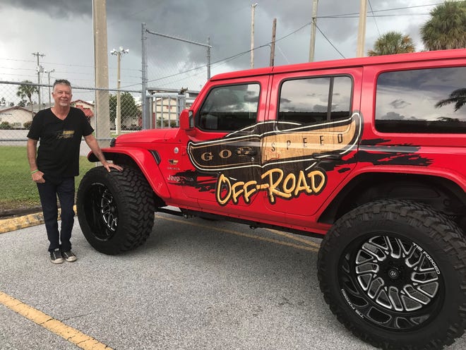 Mark Pierson, organizer of the inaugural Suncoast Jeep Festival taking place Sept. 15 at Sarasota County Fairgrounds, with his 2018 Jeep Wrangler JL outside the Sarasota location last week. [Herald-Tribune staff photo / William Wang]