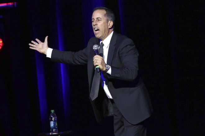 Jerry Seinfeld performs at Stand Up For Heroes, presented by the New York Comedy Festival and the Bob Woodruff Foundation, at The Theater at Madison Square Garden on Nov. 1, 2016, in New York. [Photo by Greg Allen/Invision/AP]