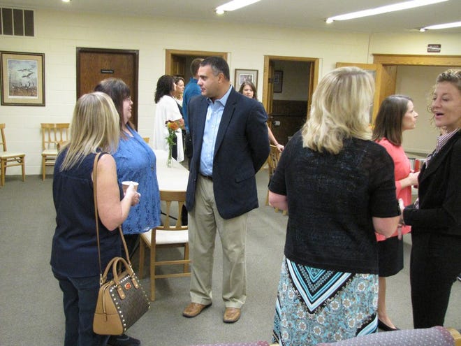 State Representative Mike Unes (R-East Peoria) met with community members during a presentation held at the Canton Area Chamber of Commerce Thursday.
