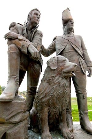 This statue of Lewis, Clark, and the Newfoundland dog Seaman, who accompanied them, is outside the Lewis and Clark Interpretive Center in Sioux City, Iowa. [Steve Stephens]