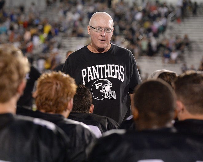 Perry coach Keith Wakefield addresses his team following the Panthers' 24-14, which gave Wakefield 200 wins at Perry, Sept. 14, 2018. (CantonRep.com / Ray Stewart)