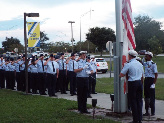 Mainland High School JROTC conducted a memorial 9/11 ceremony at the flag pole of Mainland High School on Sept. 11. Under the direction of senior cadet Arrington Woods, nearly 100 cadets stood in formation during the pledge of allegiance and a moment of silence was observed. Under the direction of Flag Team Commander cadet Jasmine Anderson, cadets Ashley Gross, Dennis Kent, Joseph McIIvenna and Zachary Boling raised the flag to half-staff. [Photo provided]