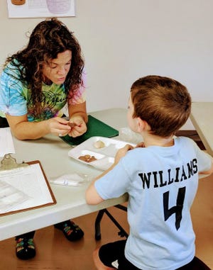 Curator of Education, Christa Foster, was on hand Saturday during Kids’ Day at the museum. The topic was archeology.