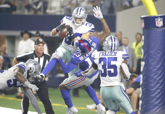 Dallas Cowboys defensive back Jeff Heath (38) breaks up a pass in the end zone intended for New York Giants wide receiver Odell Beckham (13) during the second half of Sunday's game in Arlington, Texas.    

[Ron Jenkins / Associated Press]