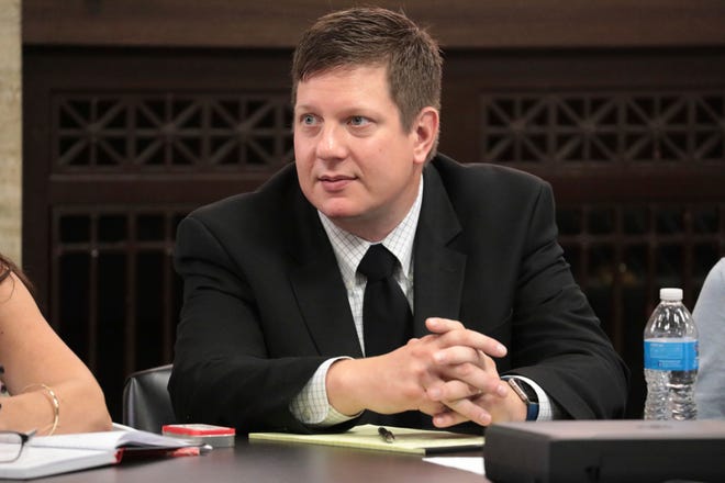Chicago police Officer Jason Van Dyke listens before his first-degree murder trial in the Oct. 20, 2014 fatal shooting of a black 17-year-old, Laquan McDonald, at the Leighton Criminal Court Building on Monday, Sept. 17, 2018, in Chicago. Opening statements are expected Monday. (Antonio Perez/ Chicago Tribune via AP, Pool)