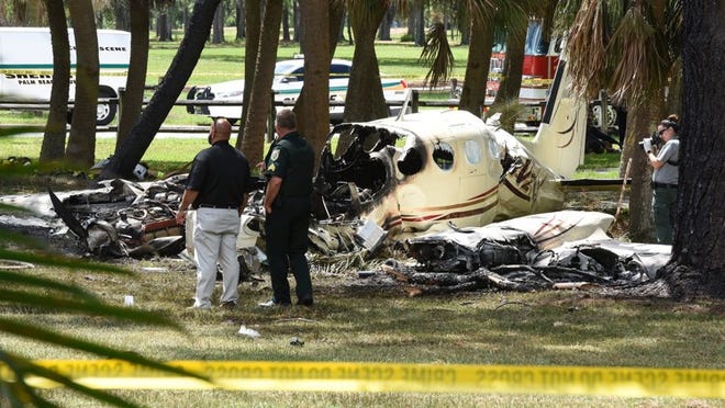 A plane crash at John Prince Park, Lake Worth, Sunday, September 9, 2018. Two people are confirmed dead. (Melanie Bell / The Palm Beach Post)