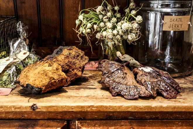 Chaga, left, and reishi mushrooms have a bitter taste, so they are most easily enjoyed steeped in tea. [KRISTA SCHLUETER/THE NEW YORK TIMES]