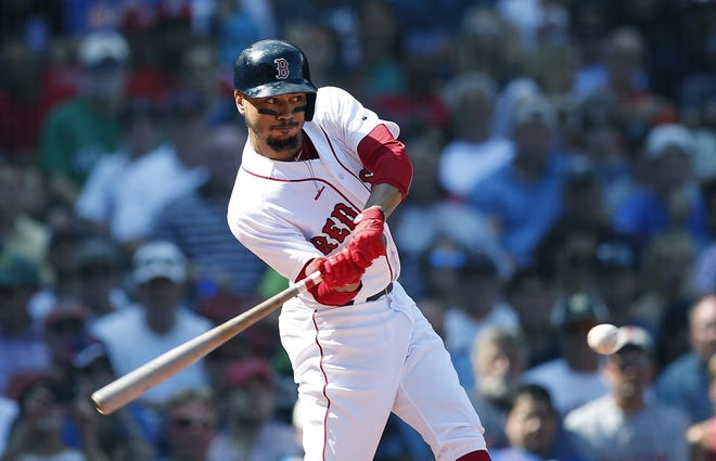 The Red Sox's Mookie Betts got the day off on Tuesday, but both he and manager Alex Cora downplayed his left-side soreness. [Michael Dwyer/The Associated Press]