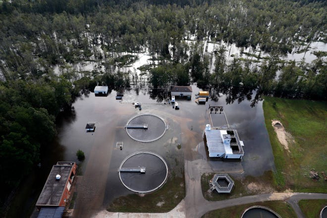 A wastewater treatment plant is inundated from floodwaters in the aftermath of Hurricane Florence in Marion, S.C., Monday, Sept. 17, 2018. (AP Photo/Gerald Herbert)