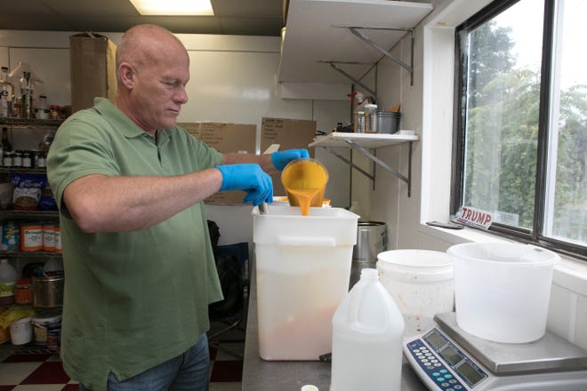 Scott Wilkinson makes Italian ices at Mr. Cannoli in New Windsor. Customers can buy cannolis and ices that are infused with cannabidiol, a non-psychoactive cannabis chemical. [PHOTOS BY ALLYSE PULLIAM/FOR THE TIMES HERALD-RECORD]