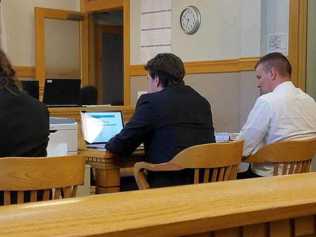 Eric Parmenter, right, waits for the start of his trial with his attorney, Chris Kemp, on Tuesday, Sept. 18. PHOTO BY ALLISON ULLMANN/THE PERRY CHIEF
