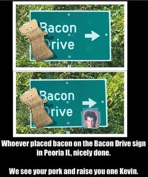 The internet meme that's sweeping Peoria, sorta: Someone defaced one of the Bacon Drive signs along War Memorial Drive in the northwest part of town. A photo of actor/musician Kevin Bacon is at the lower right.