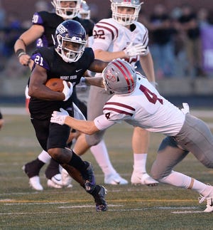 Mount Union's Jared Ruth returns a punt against Rose-Hulman in the first half, Sept. 1, 2018. (CantonRep.com / Ray Stewart)
