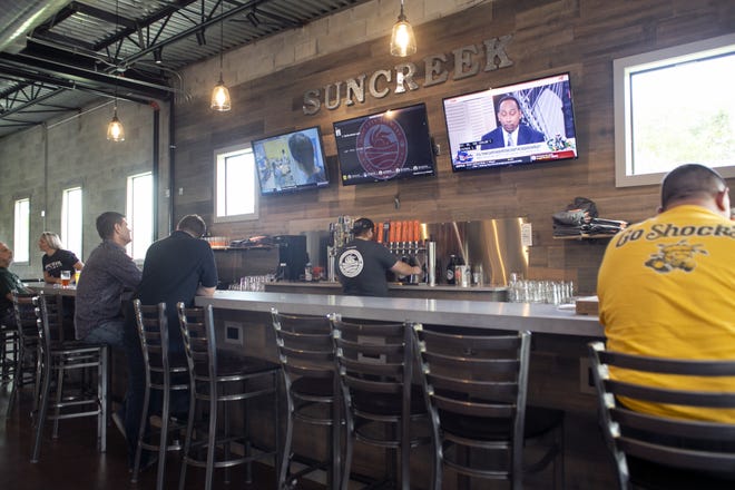 Suncreek Brewery offers a tap room bar and dining area at their new location in Clermont. [Cindy Sharp/Correspondent]