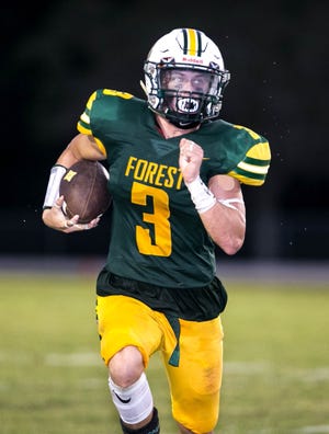 Forest's (3) Chase Oliver carries the ball in the first half against Leesburg, Friday, September 14, 2018 at Forest High School in Ocala, Florida. At the half the Wildcats were up 28-13. [Cyndi Chambers/Ocala Star Banner Correspondent] 2018