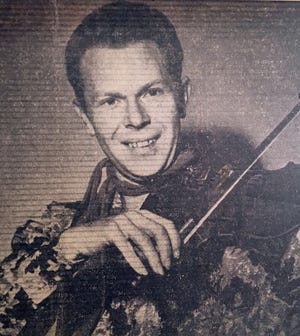 Fiddle player Ray Crisp is seen in a 1950s Gaston Gazette photo. [COURTESY MARY DAPHINE CRISP]