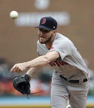 Red Sox starting pitcher Chris Sale throws a pitch against the Detroit Tigers on July 22nd in Detroit. The Sox lefty hopes to be 100 percent healthy once the postseason comes around. [AP Photo/Carlos Osorio]