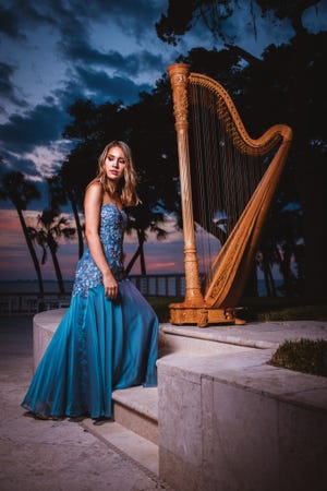 Katherine Siochi is principal harpist for the Sarasota Orchestra and a soloist in the opening Discoveries concert on Sept. 29. [Provided by Sarasota Orchestra / Kabir Cardenas]