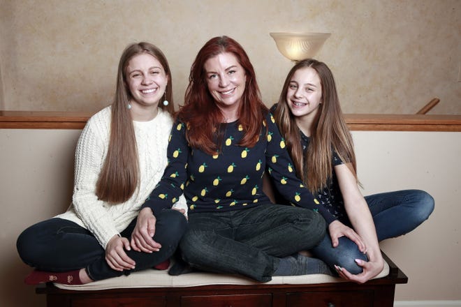 Kimberley Watry with her daughters Olivia, 17, and Norah, 12, in Chicago, Ill. Watry says that because her eldest daughter was taken advantage of in a friendship, she now gets involved when her youngest daughter has friends with bad manners. [TRIBUNE NEWS SERVICE]