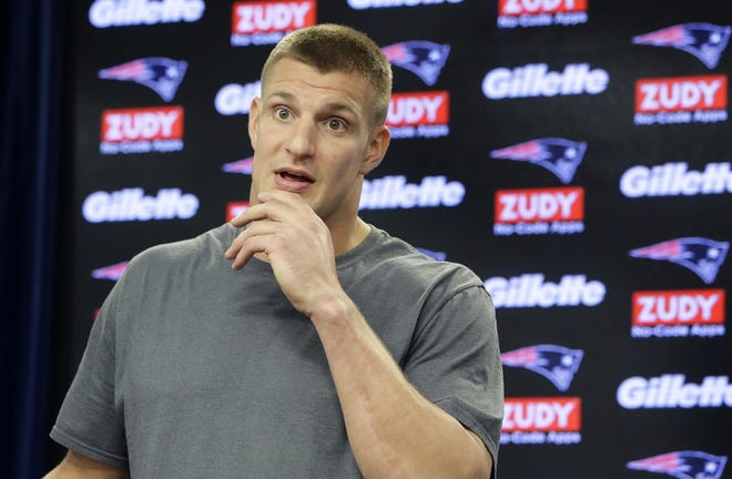 The New England Patriots reportedly tried to trade Rob Gronkowski to the Detroit Lions in the offseason before the star tight end threatened to retire if he was traded. [AP Photo/Steven Senne]