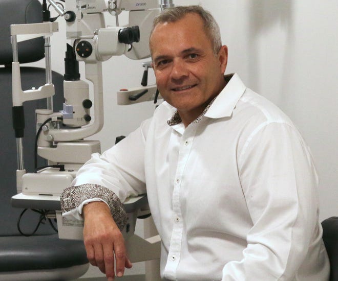Dr. Peter Mocklis, owner of Lens Doctors, talks about the state-of-the-art equipment to better service patients in the new facility on Lafayette Road in Portsmouth. [Suzanne Laurent photo]