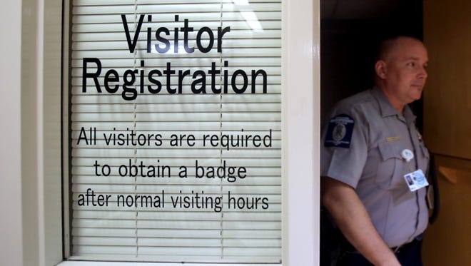 Billy Marshall leaves the visitor registration center at Carolinas HealthCare System Cleveland. [Brittany Randolph/The Star]
