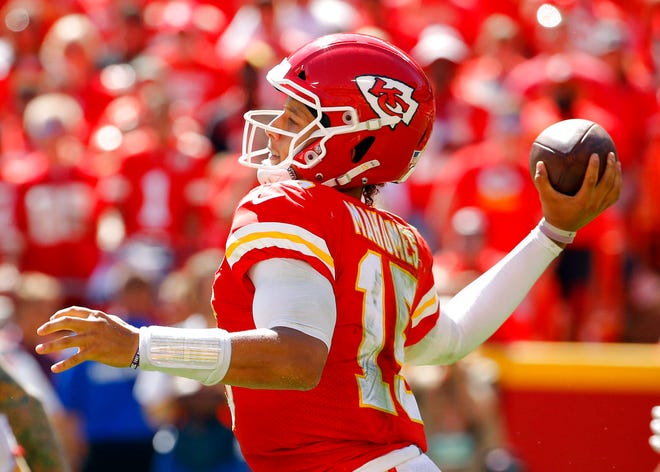 Kansas City Chiefs quarterback Patrick Mahomes (15) prepares to throw during the second half of an NFL football game against the San Francisco 49ers in Kansas City, Mo., Sunday, Sept. 23, 2018. (AP Photo/Charlie Riedel)
