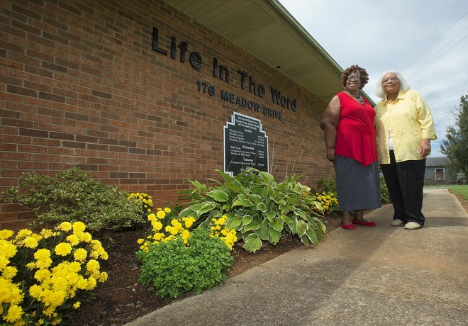Connie Russell (left) and Georgia Littlejohn stand outside of Life in the Word Church on Meadow Drive where they are coordinating a 'Kicking Disease Out of Our Kitchen' outdoor educational fair on Oct. 6. [Donnie Roberts/The Dispatch]