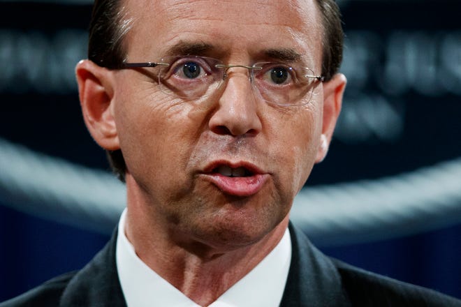 FILE - In this July 13, 2018 file photo, Deputy Attorney General Rod Rosenstein speaks during a news conference at the Department of Justice in Washington. Rosenstein is expecting to be fired, heading to White House Monday morning.(AP Photo/Evan Vucci)