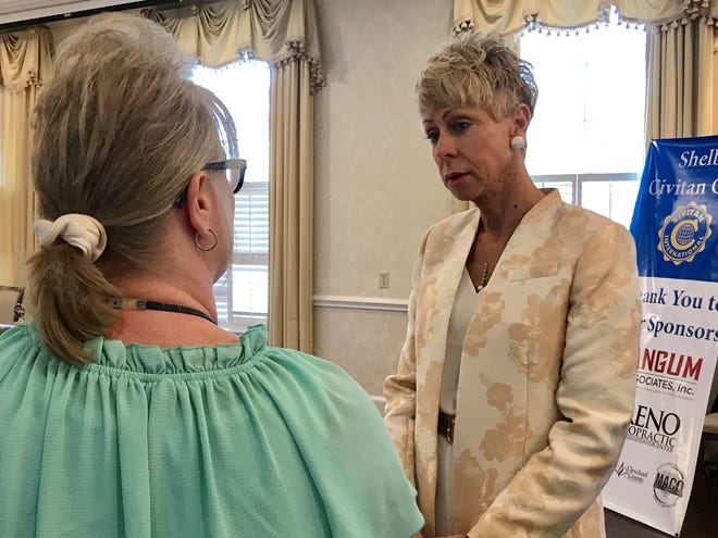 State Auditor Beth Wood talks to people after the Shelby Civitan meeting about what her office does. [Joyce Orlando/The Star]