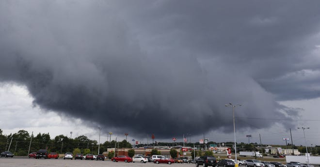 An impressive thundercloud rolls across Tuscaloosa as showers pop up Monday afternoon, Sept. 24, 2018. [Staff Photo/Gary Cosby Jr.]