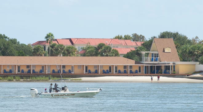 A boat passes the Edgewater Inn on Anastasia Island, north of the Bridge of Lions, in St. Augustine on Monday. The hotel was one of many St. Johns County businesses impacted by hurricanes in 2016 and 2017. A U.S. Census Bureau report released Monday shows that a major storm would affect the jobs of thousands of local workers and businesses. [PETER WILLOTT/THE RECORD