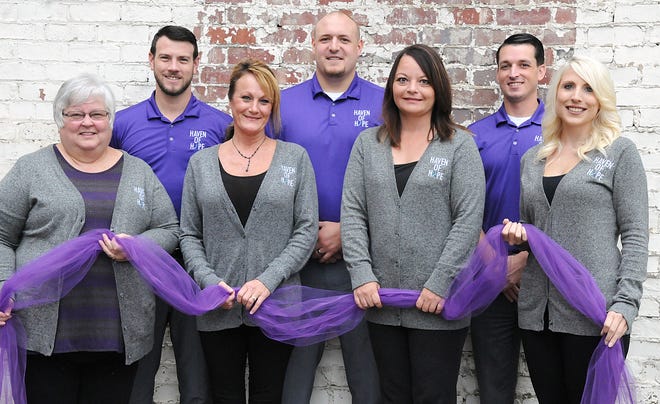 The staff of Haven of Hope is taking part in Domestic Violence Awareness Month. Front, l to r, Tammy Geese, Stephanie Kobie, Michelle Carpenter, Jenna Black. Back, l to r, Evan McCartney, Taylor Leppla and Trevor Markley.