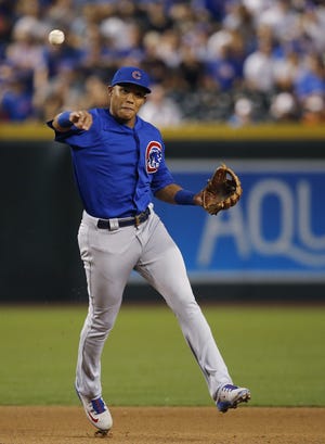 Chicago Cubs shortstop Addison Russell throws to first base for an out against the Arizona Diamondbacks during the ninth inning of a baseball game Monday, Sept. 17, 2018, in Phoenix. The Cubs defeated the Diamondbacks 5-1. (AP Photo/Ross D. Franklin)