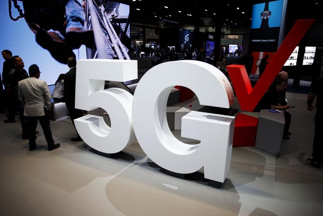 Verizon 5G wireless signage at the Mobile World Congress Americas in Los Angeles on Sept. 12, 2018. MUST CREDIT: Bloomberg photo by Patrick T. Fallon.